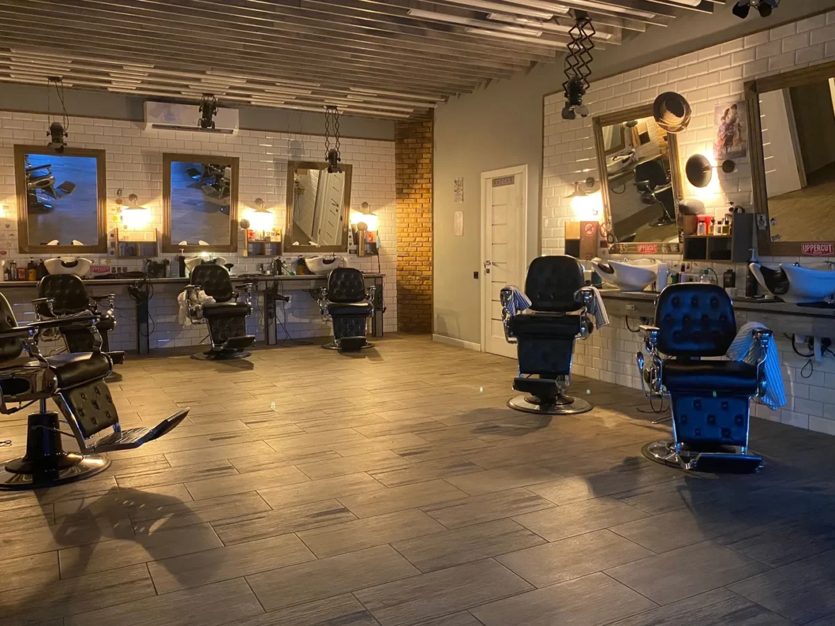 Barbershop interior with empty barber chairs