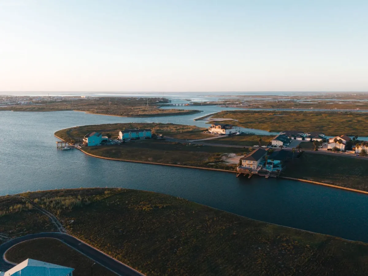 Aerial view of waterfront homes in Corpus Christi at sunset
