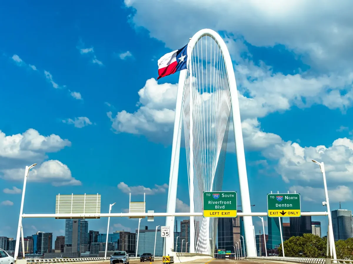 Texas flag flying from the Margaret Hunt Hill Bridge in Dallas
