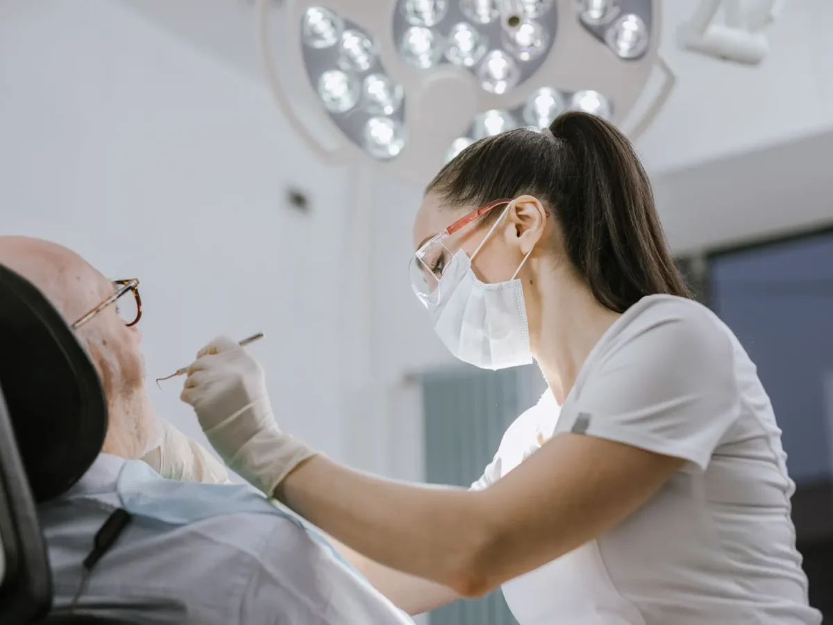 Dentist treating a patient in a modern dental office