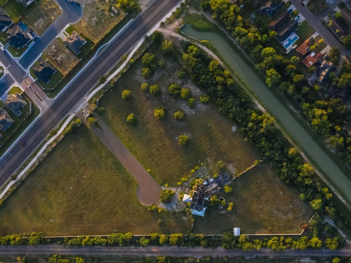 Aerial view of a neighborhood and fields in Edinburg, Texas