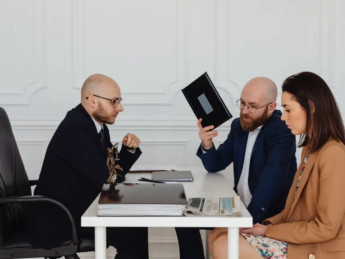 Couple meeting with a family law attorney