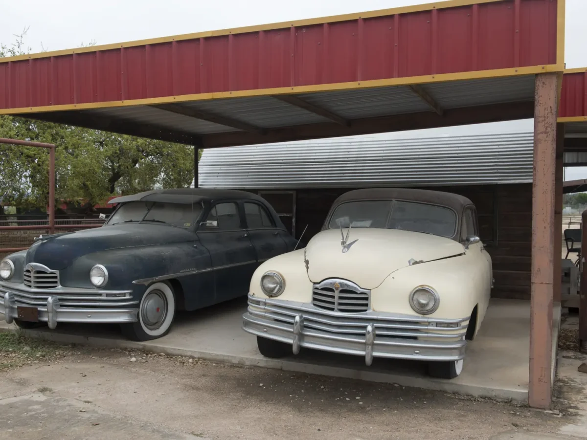 Vintage cars at a re-created gas station in Marble Falls, Texas